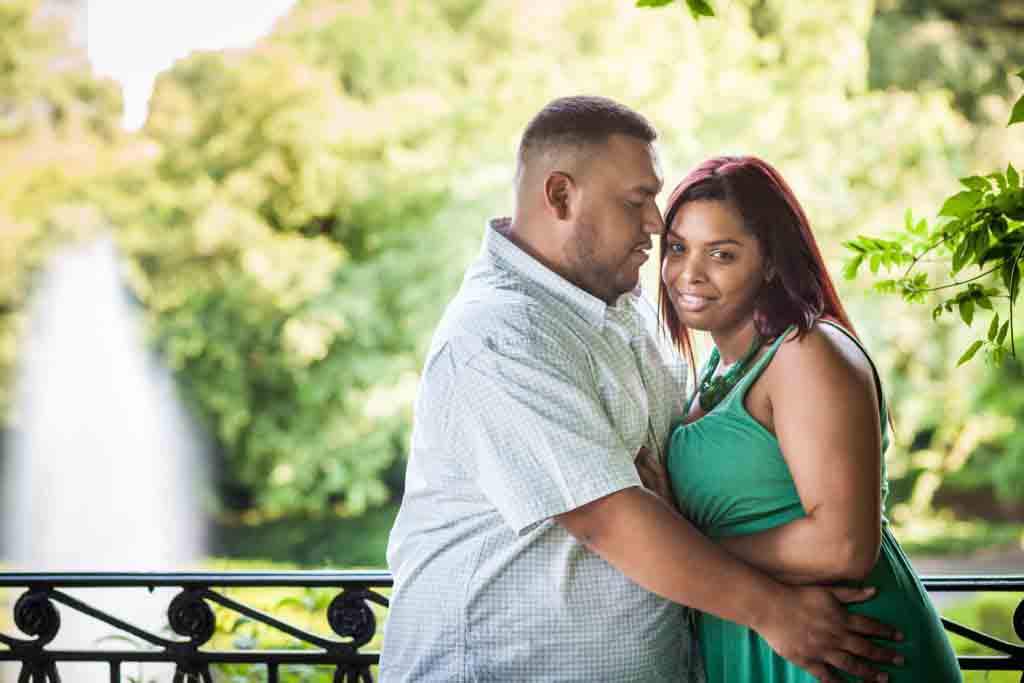 Couple hugging in Conservatory Garden during a Central Park engagement shoot