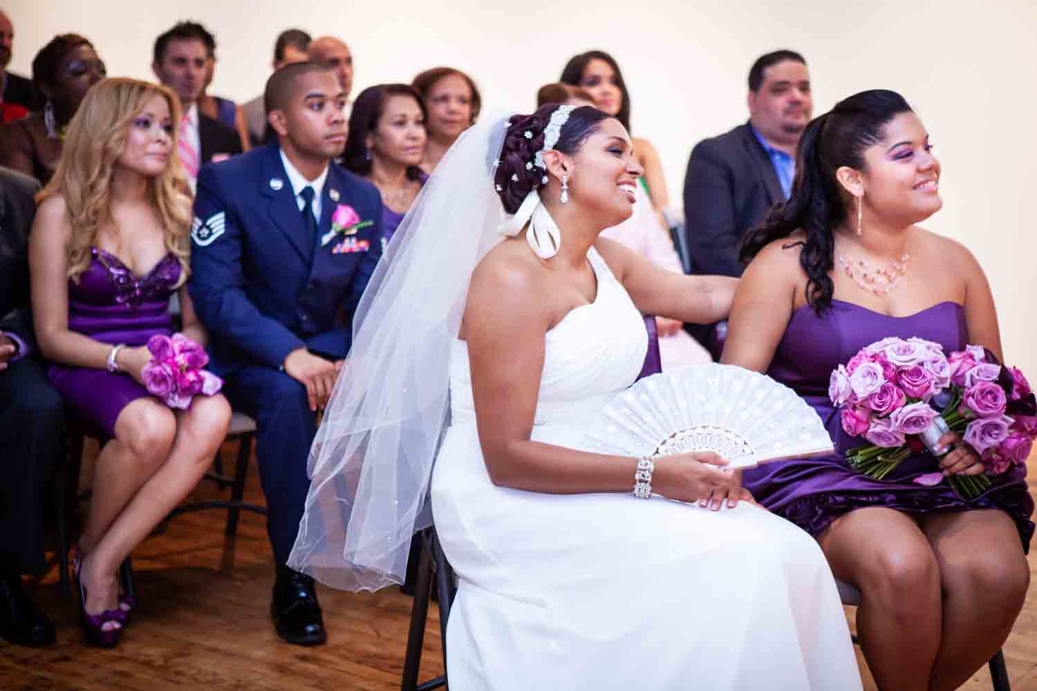Bride and guests listening to ceremony at an Attic Studios wedding