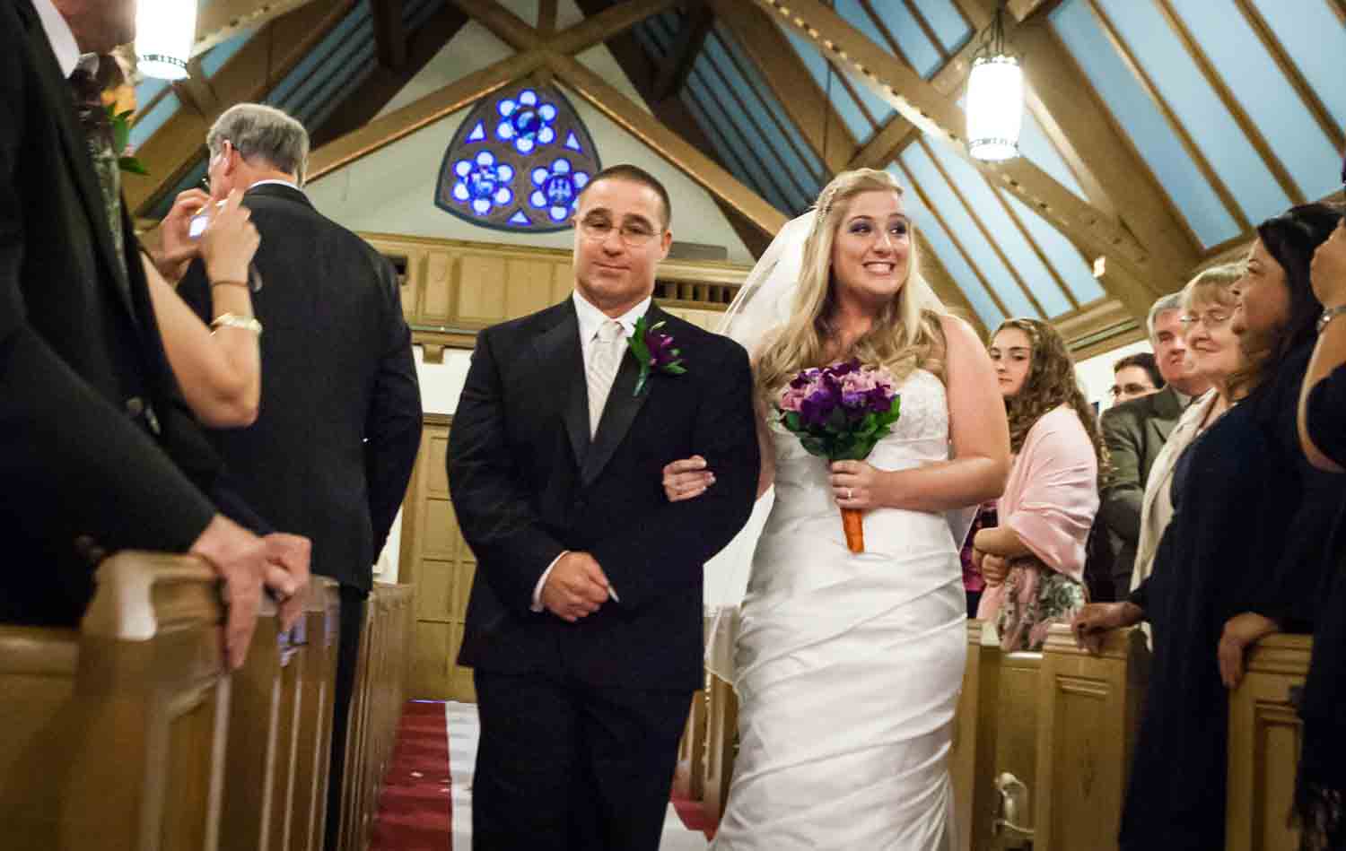Bride and father walking down aisle at a Fort Hamilton Community Center wedding