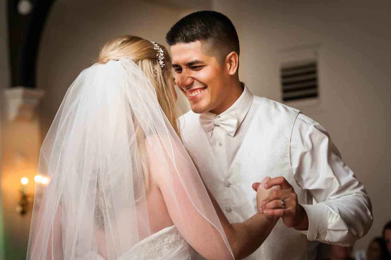 Bride and groom during first dance at a Fort Hamilton Community Center wedding