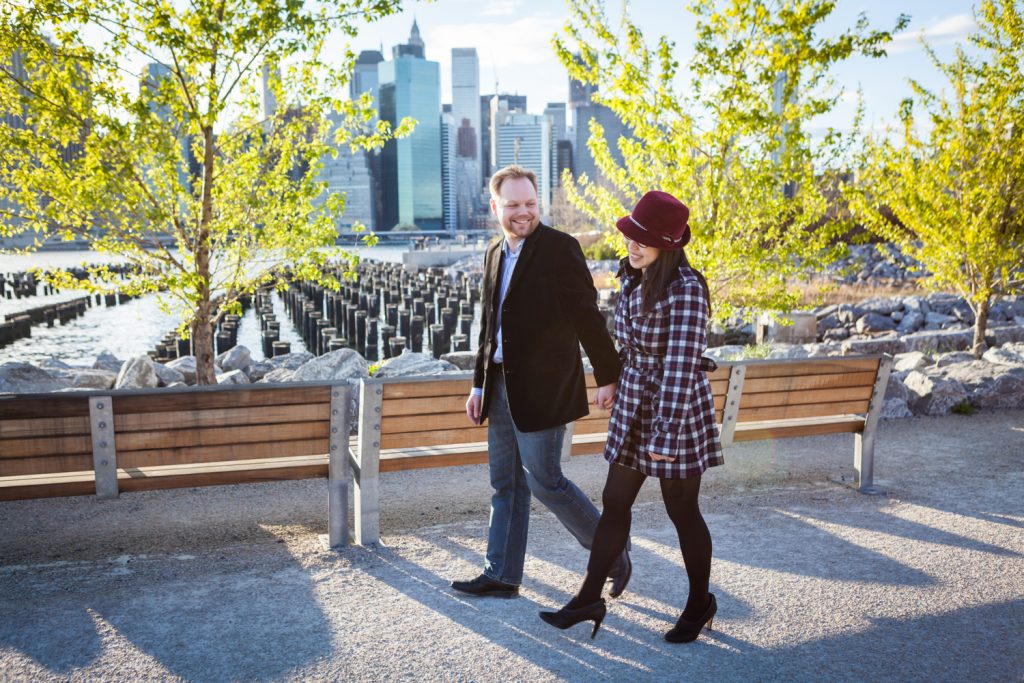Couple walking along pathway in Brooklyn Bridge Park