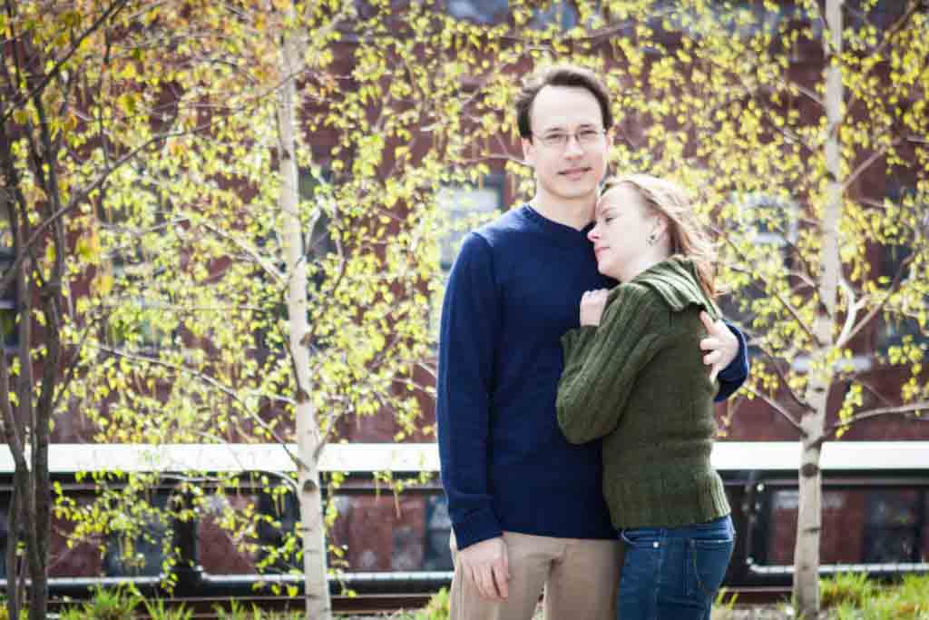 Couple hugging during a High Line engagement portrait session
