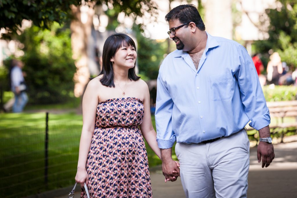 Couple walking during a Madison Square Park engagement session