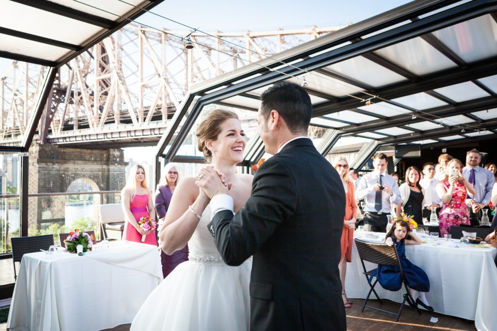Bride and groom during first dance at a Ravel Hotel Penthouse wedding