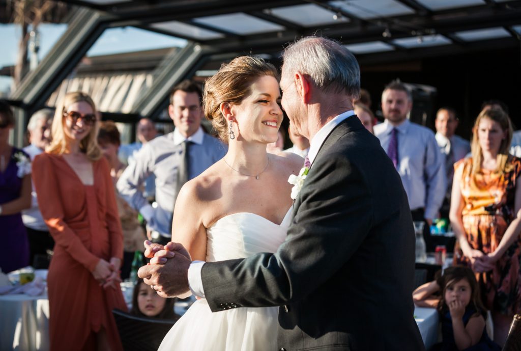 Father-daughter dance at a Ravel Hotel Penthouse wedding