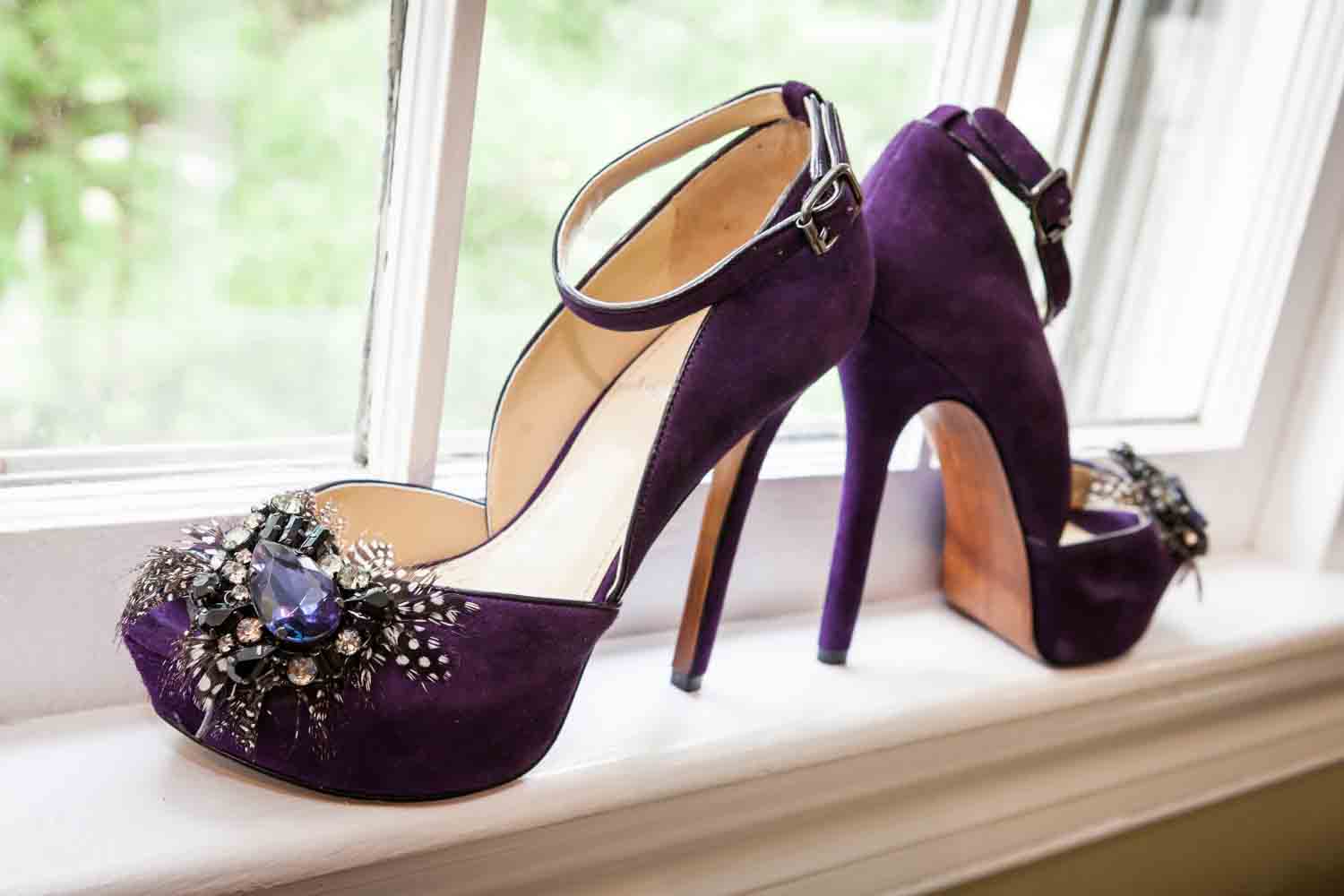 Close up on purple suede high heels with features