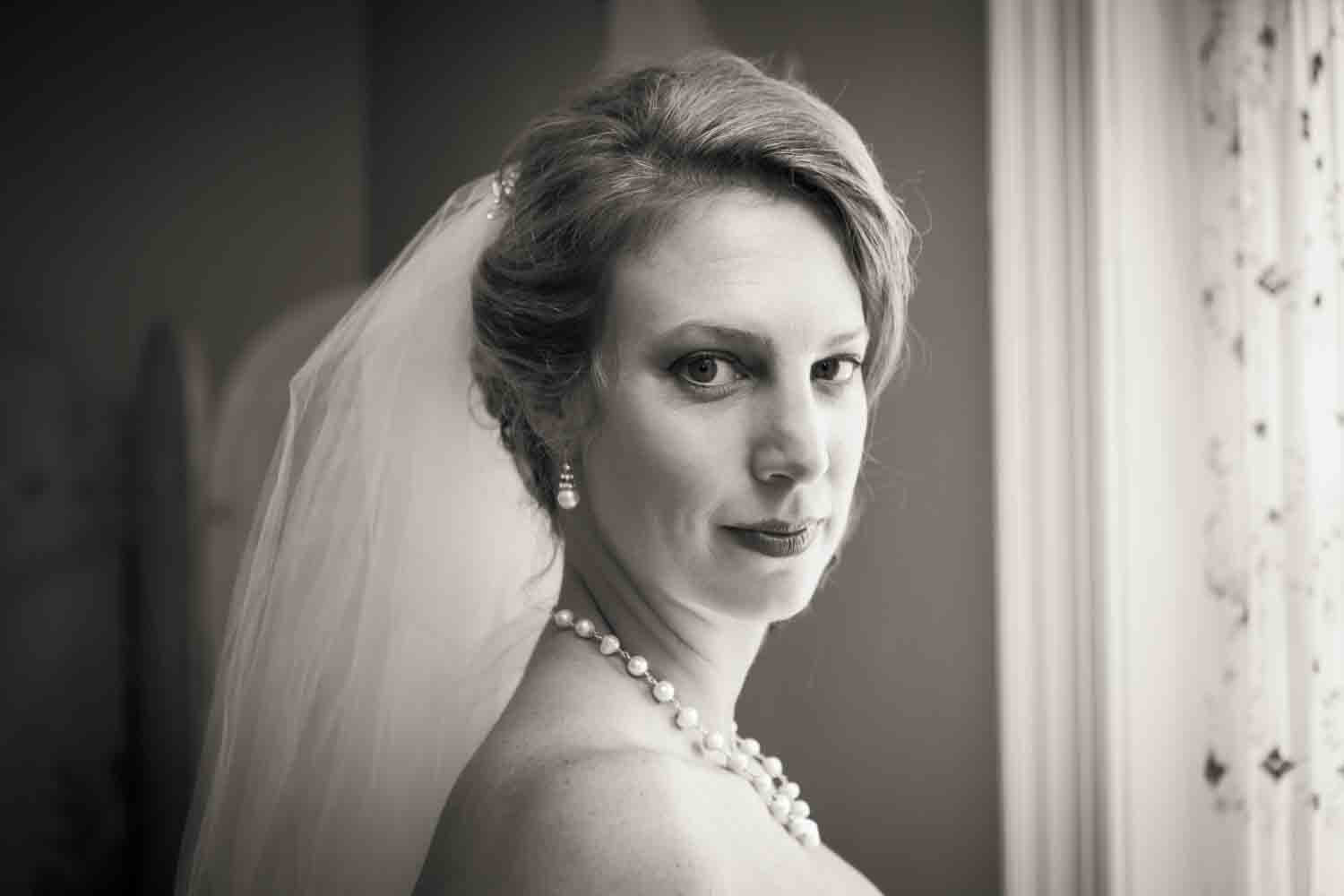 Black and white portrait of bride at a Davenport Mansion wedding