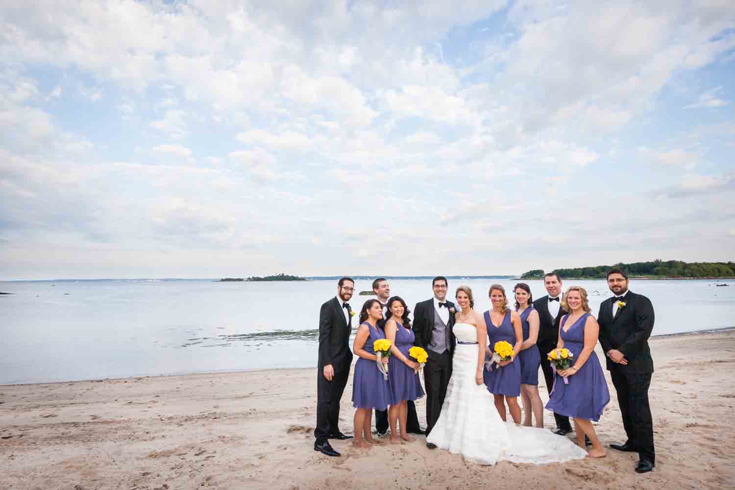 Bridal party on beach at a Davenport Mansion wedding