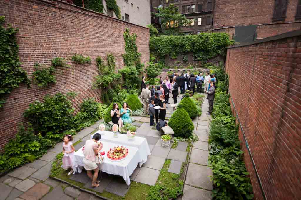 Wide shot of back garden patio at a Merchant's House Museum wedding