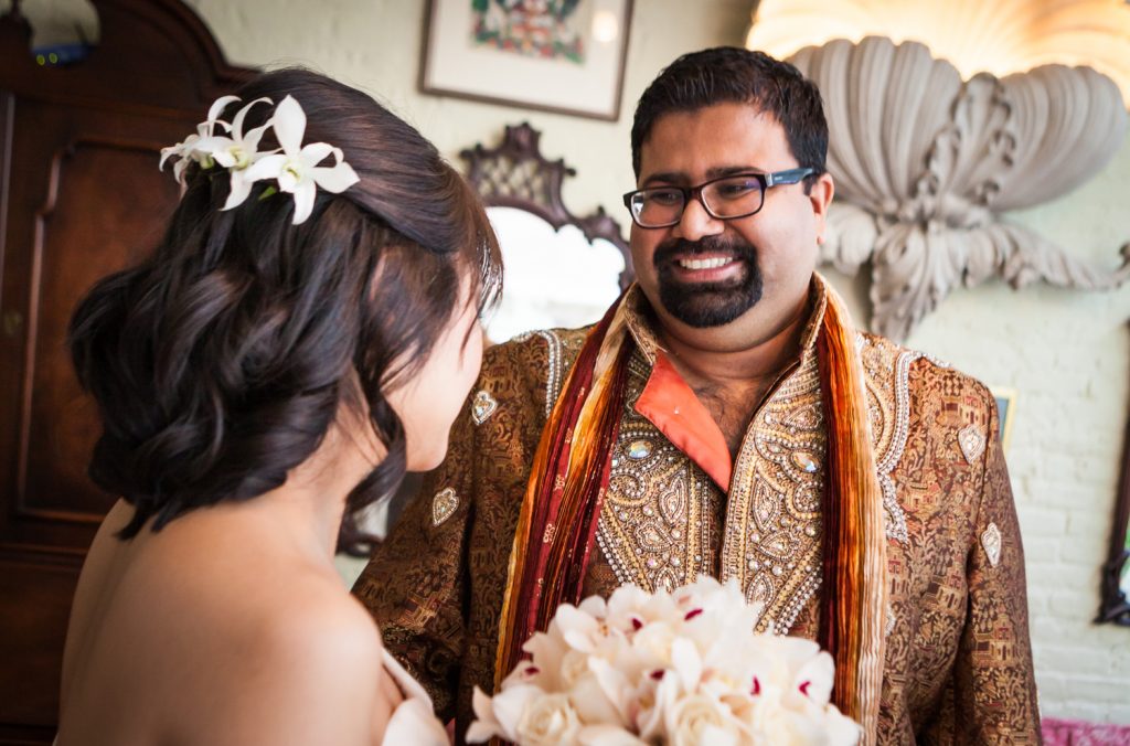 Groom seeing bride during first look at an Alger House wedding
