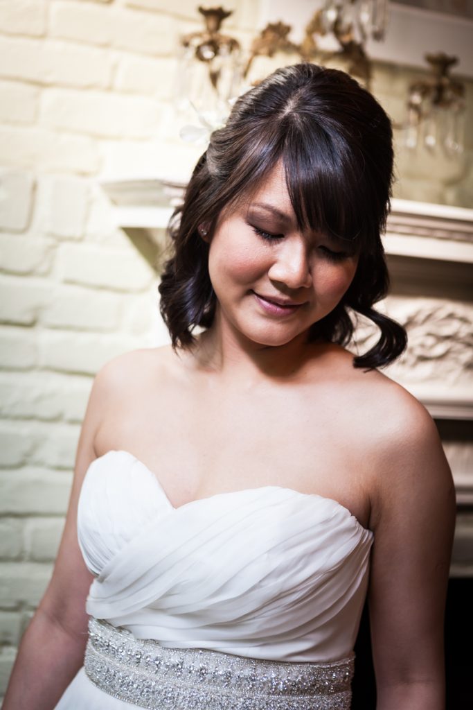 Portrait of bride wearing strapless white dress at an Alger House wedding
