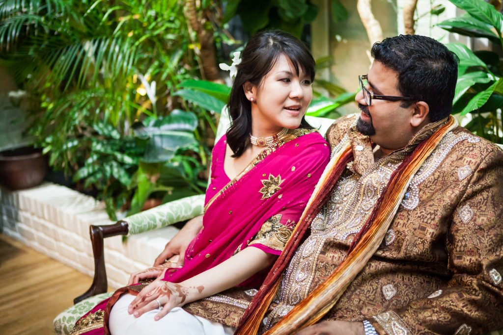 Bride and groom wearing traditional Indian attire at an Alger House wedding