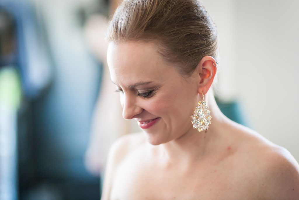 Bride wearing sparkly earring at a Brooklyn Bridge Park wedding