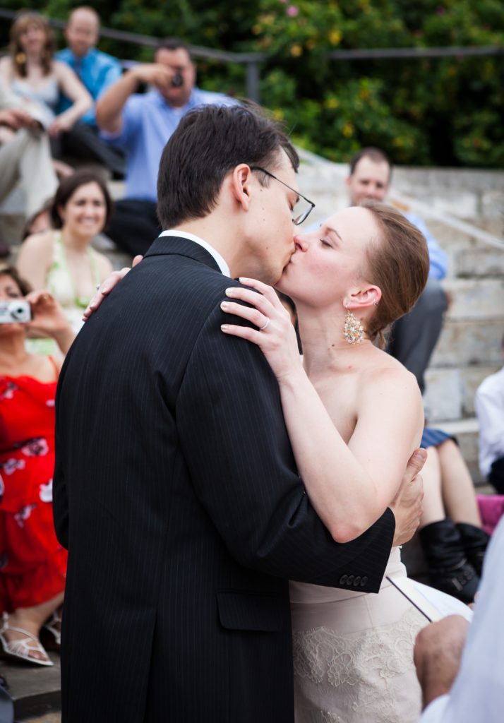 Bride and groom kissing after ceremony at a Brooklyn Bridge Park wedding