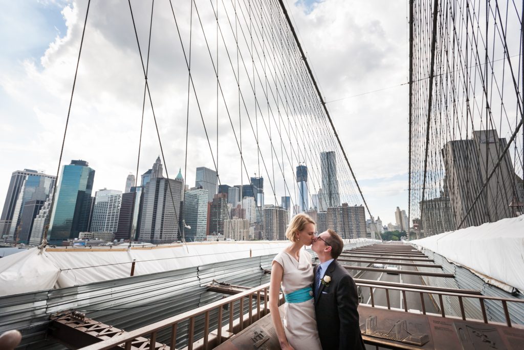 Couple on Brooklyn Bridge at a NYC City Hall wedding