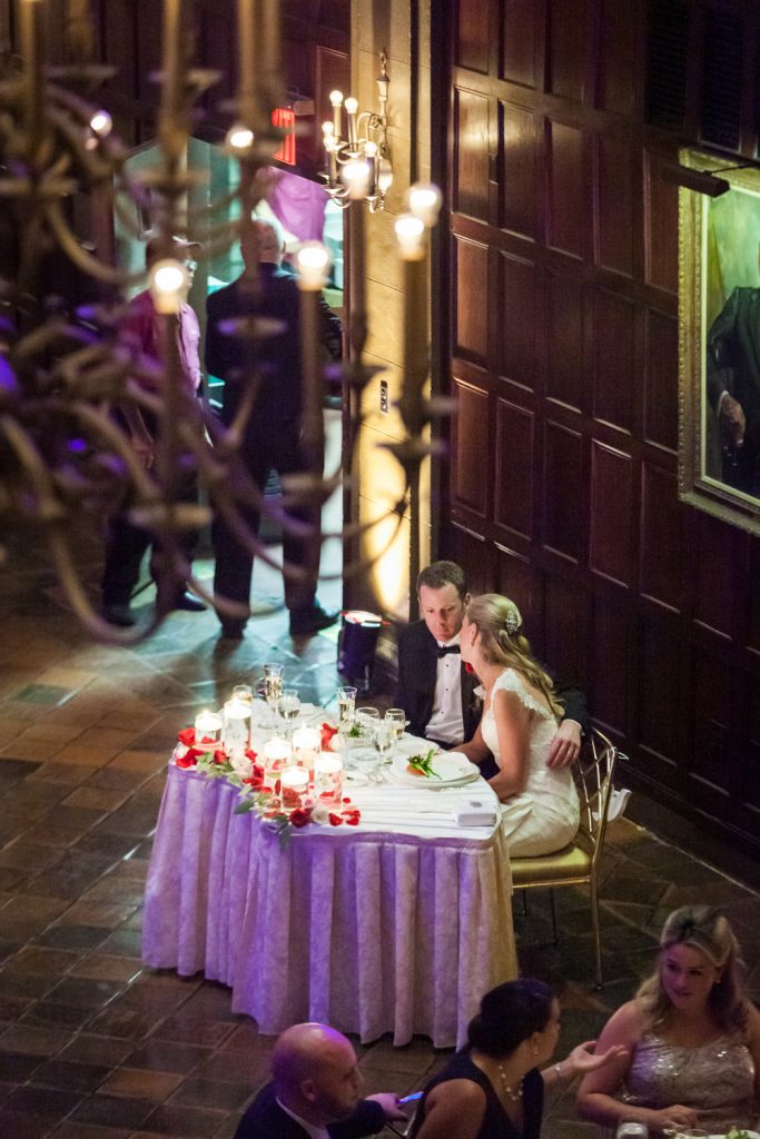 View from balcony of bride and groom at sweetheart table at Harvard Club