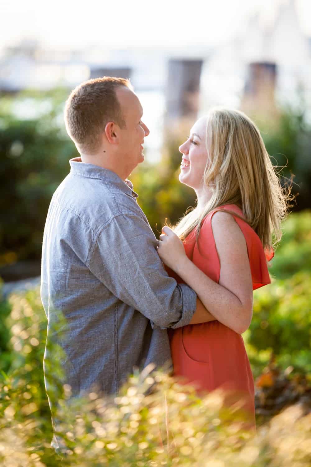 Couple in middle of park at a Battery Park engagement shoot