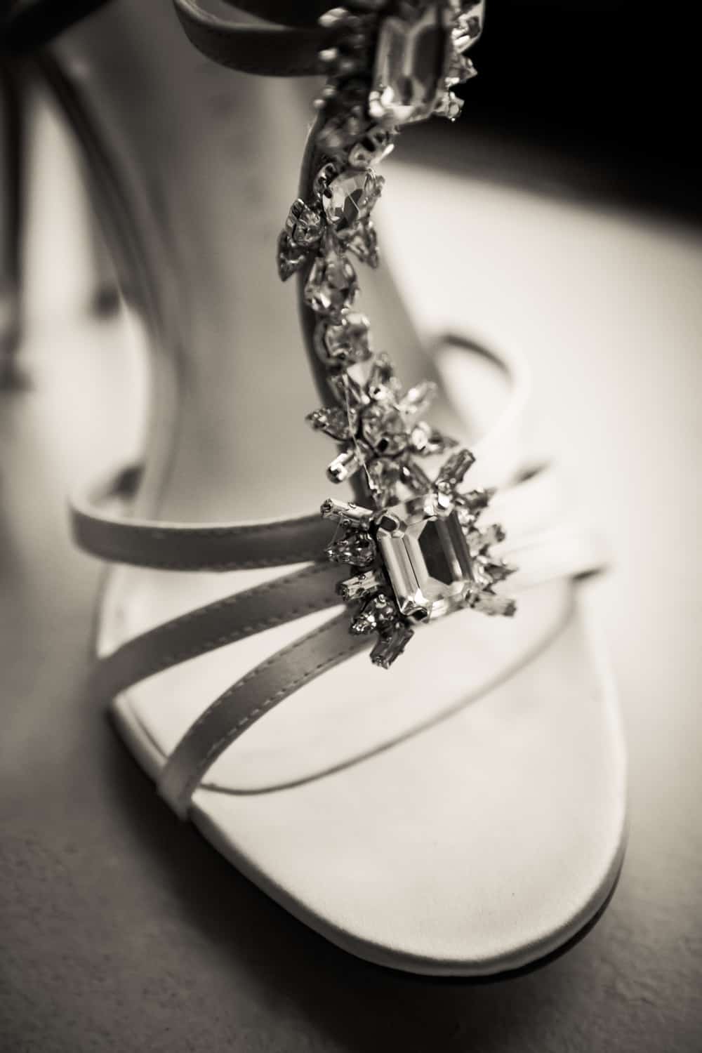Black and white photo of high-heeled sandal