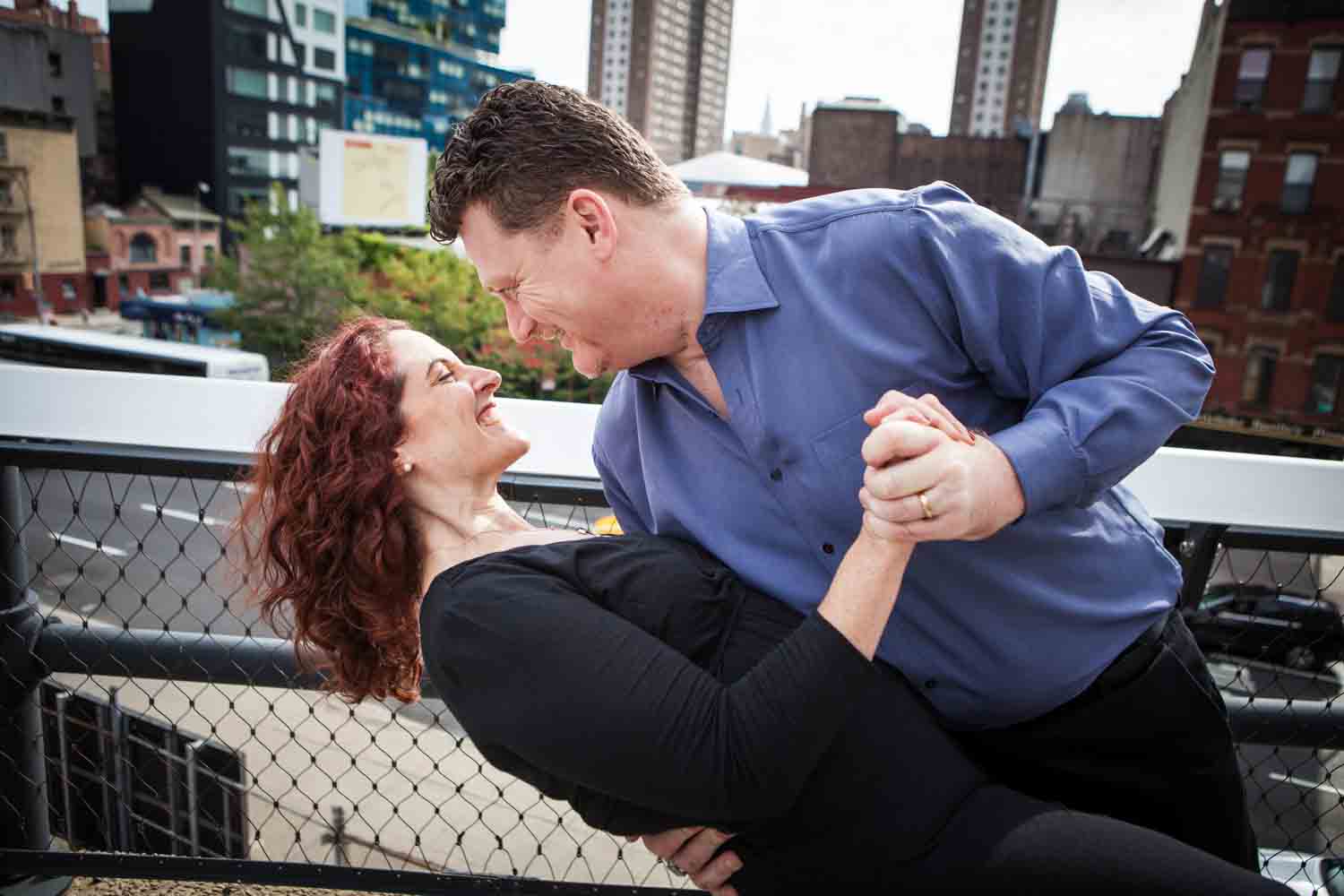 High Line engagement photos of couple dancing on observation deck