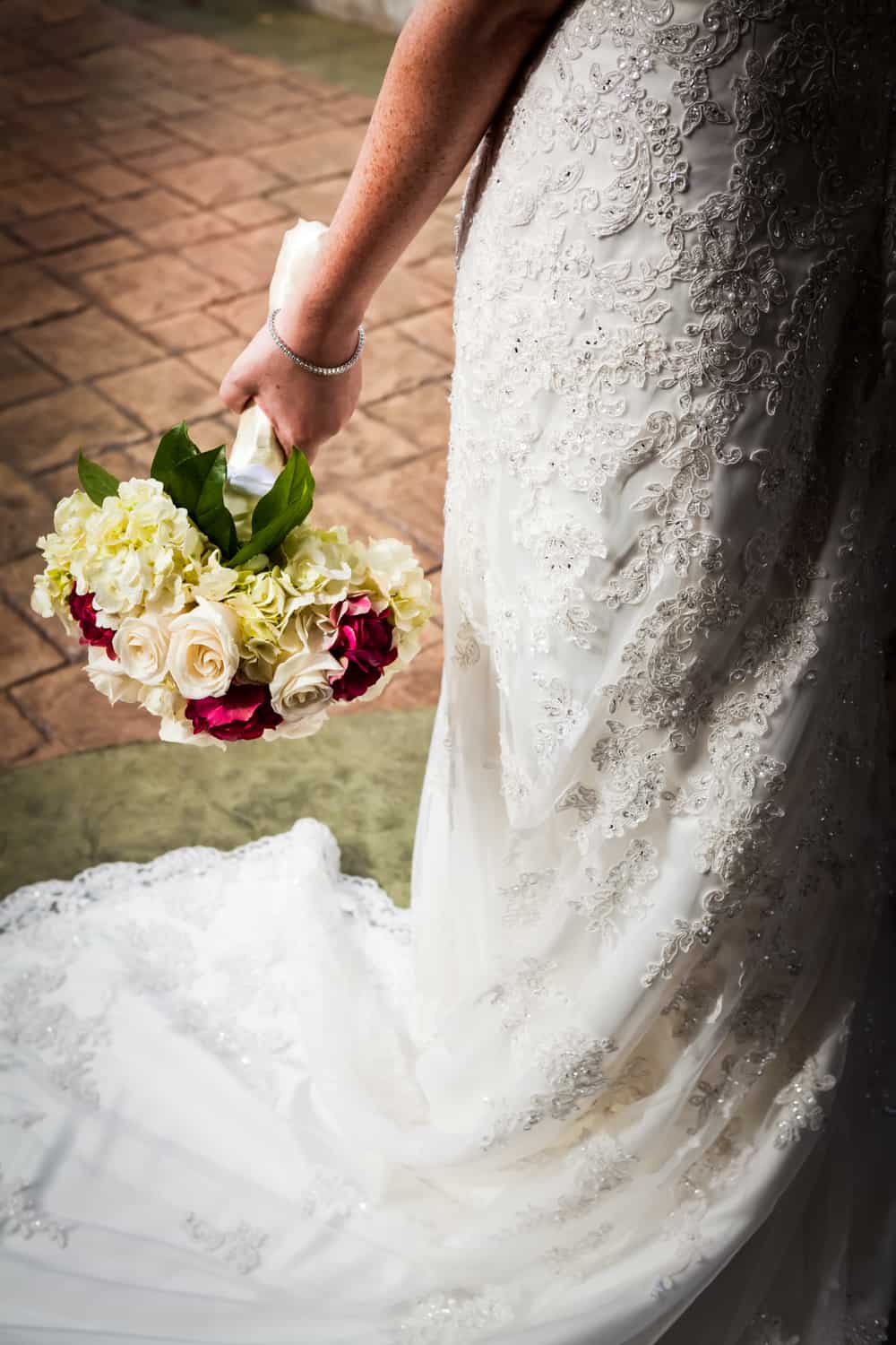 Close up on bride holding bouquet