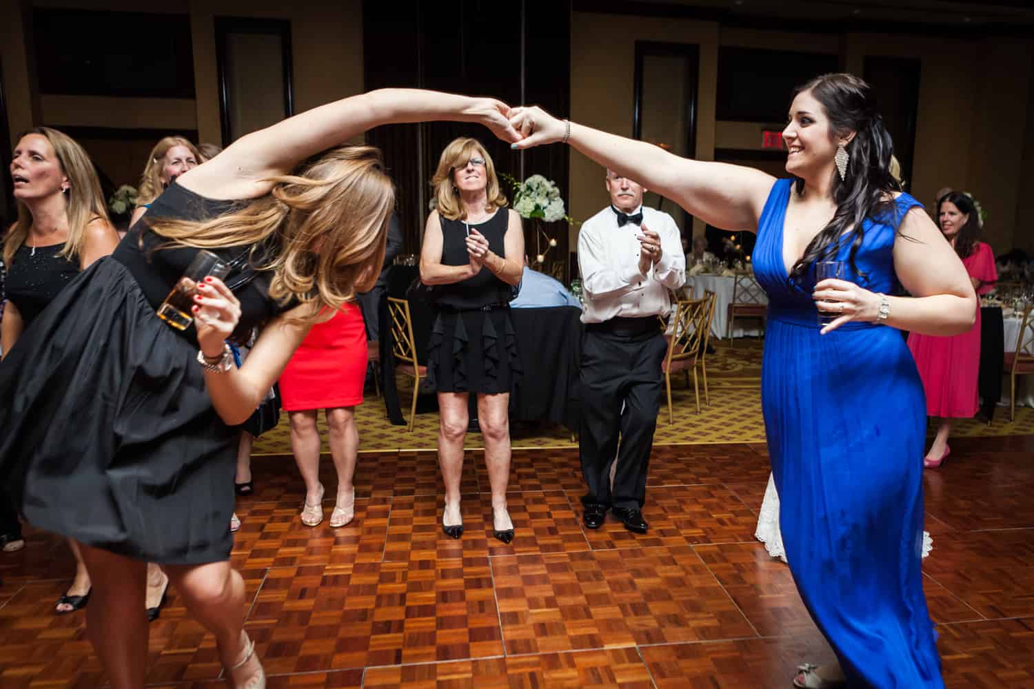 Two women dancing at a Nicotra's Ballroom wedding
