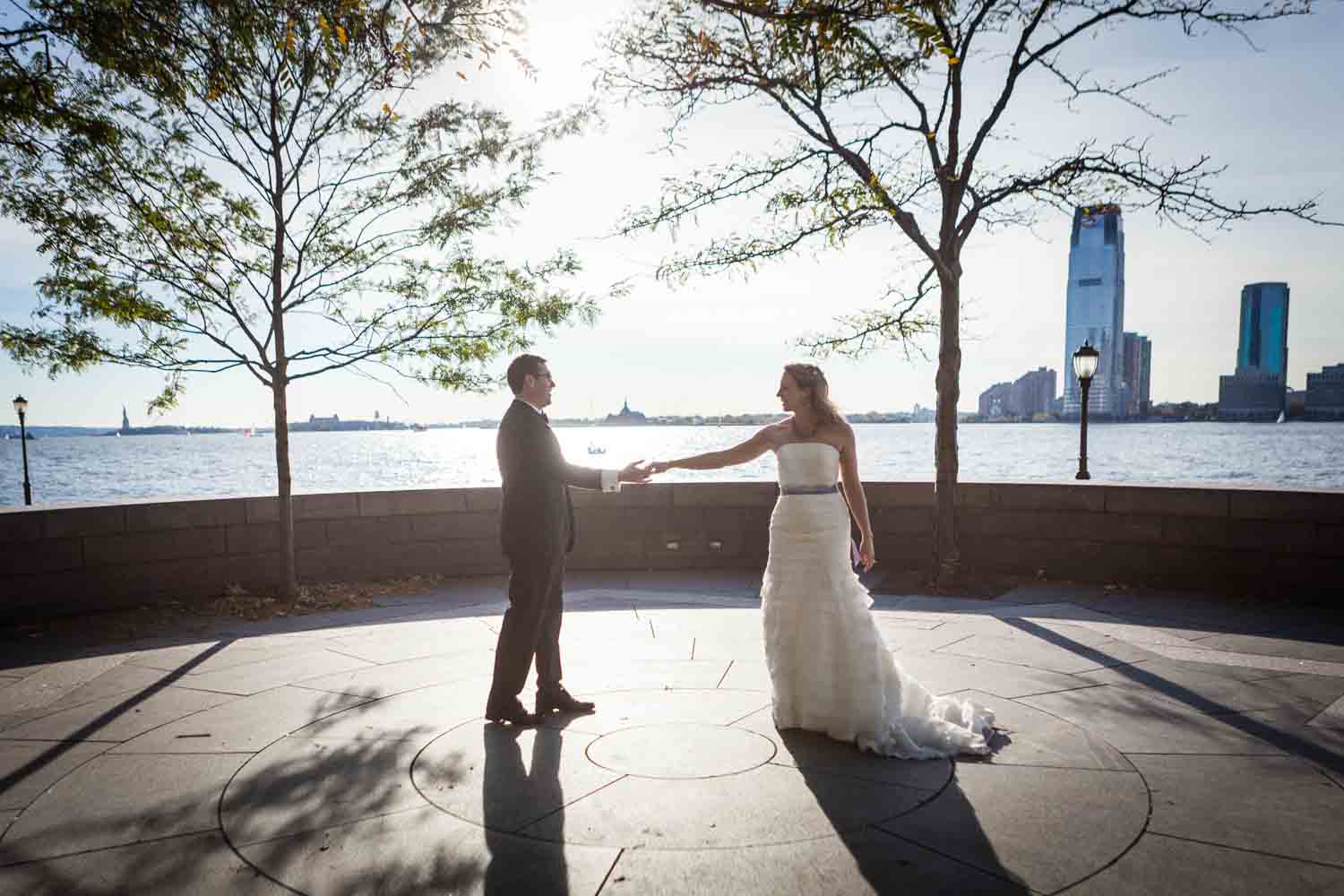 Bride and groom dancing at Rockefeller Park