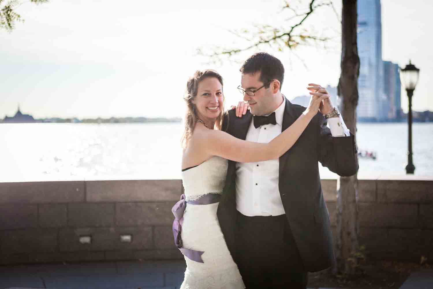 Bride and groom dancing at Rockefeller Park