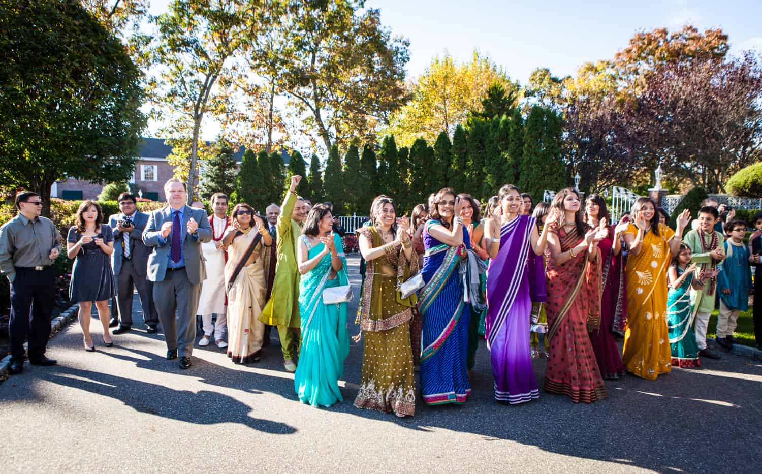 Bride's family members wearing colorful saris at an East Wind Inn wedding