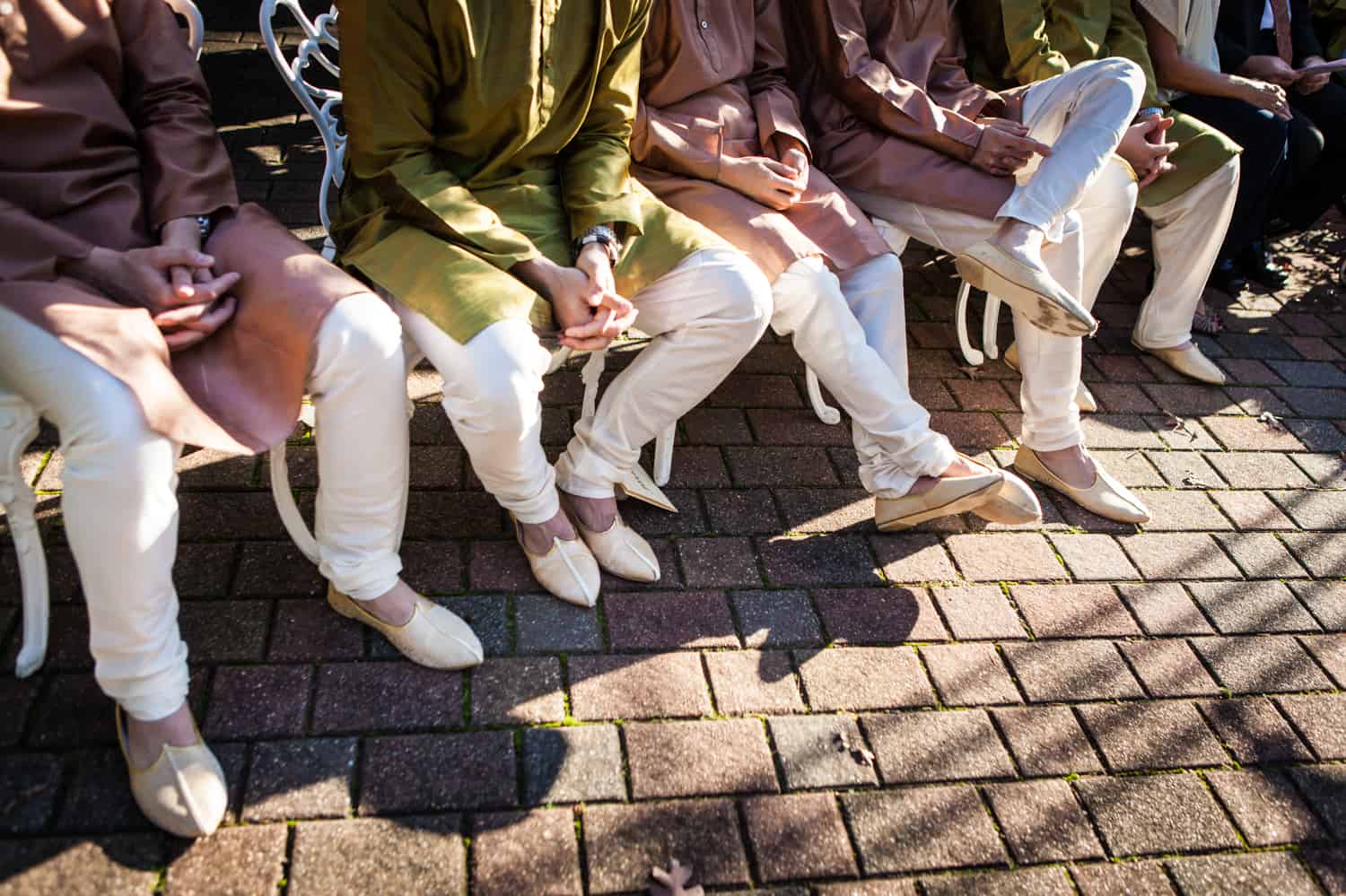 Close up on traditional Indian footwear of groomsmen