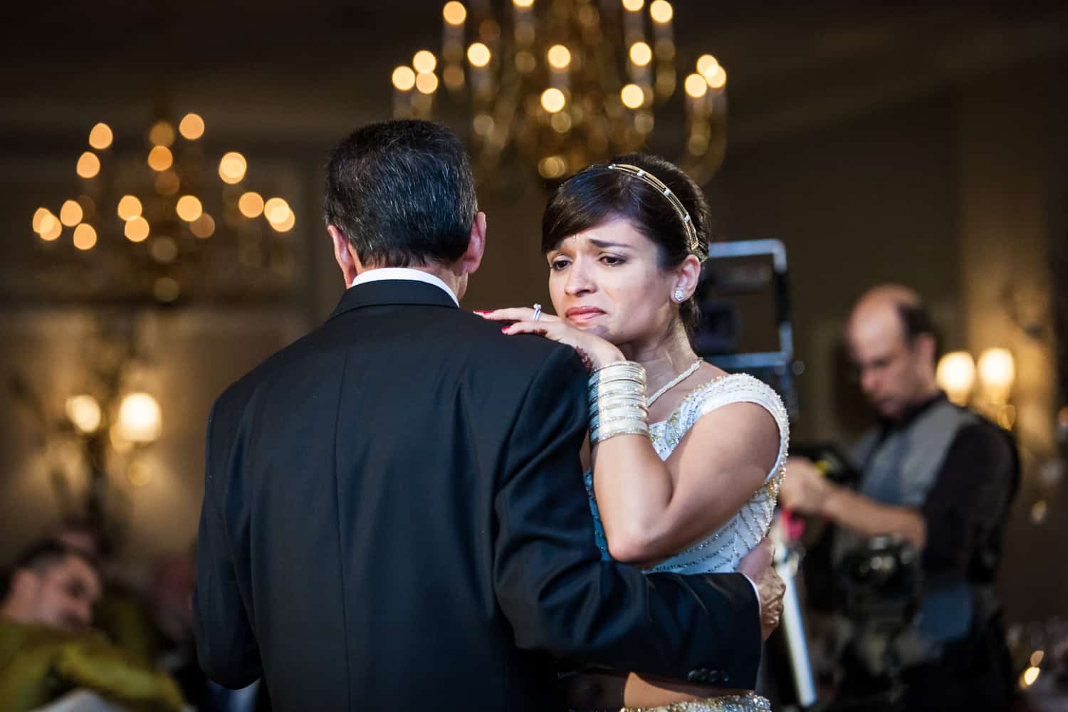 Bride crying while dancing with father at an East Wind Inn wedding reception