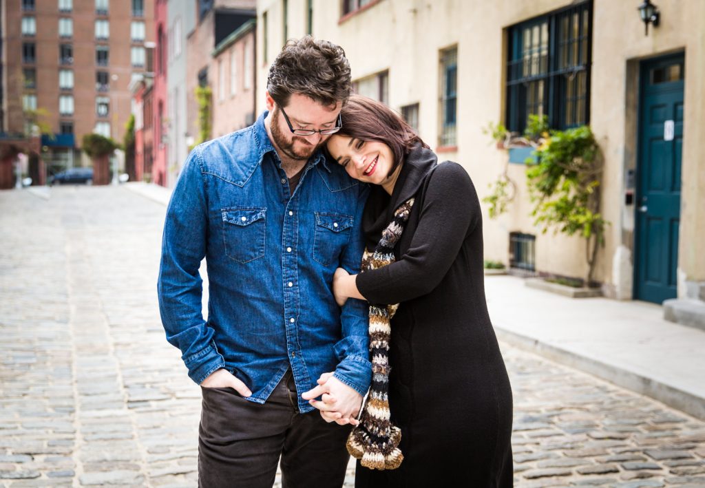Couple standing in middle of Washington Mews during a Greenwich Village engagement session