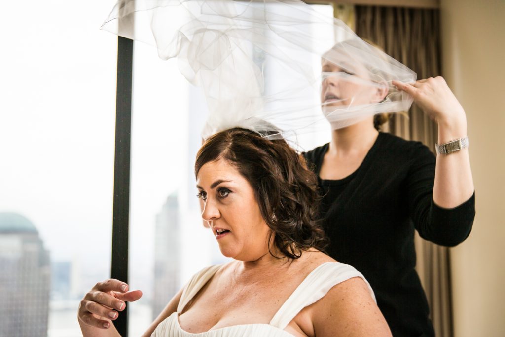Bride flipping back her veil for a Locanda Verde wedding