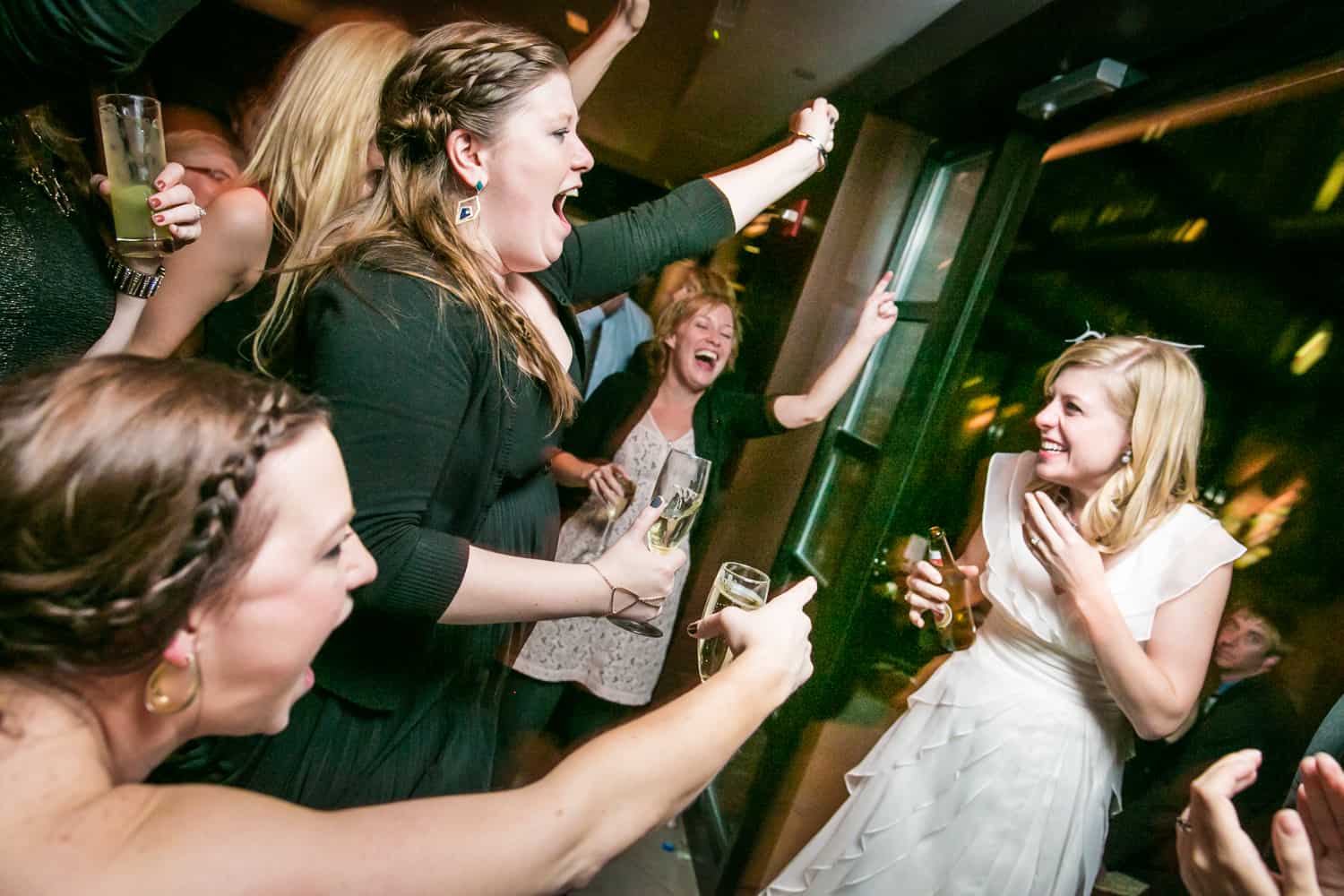 Guests cheering on bride at a Library Hotel wedding