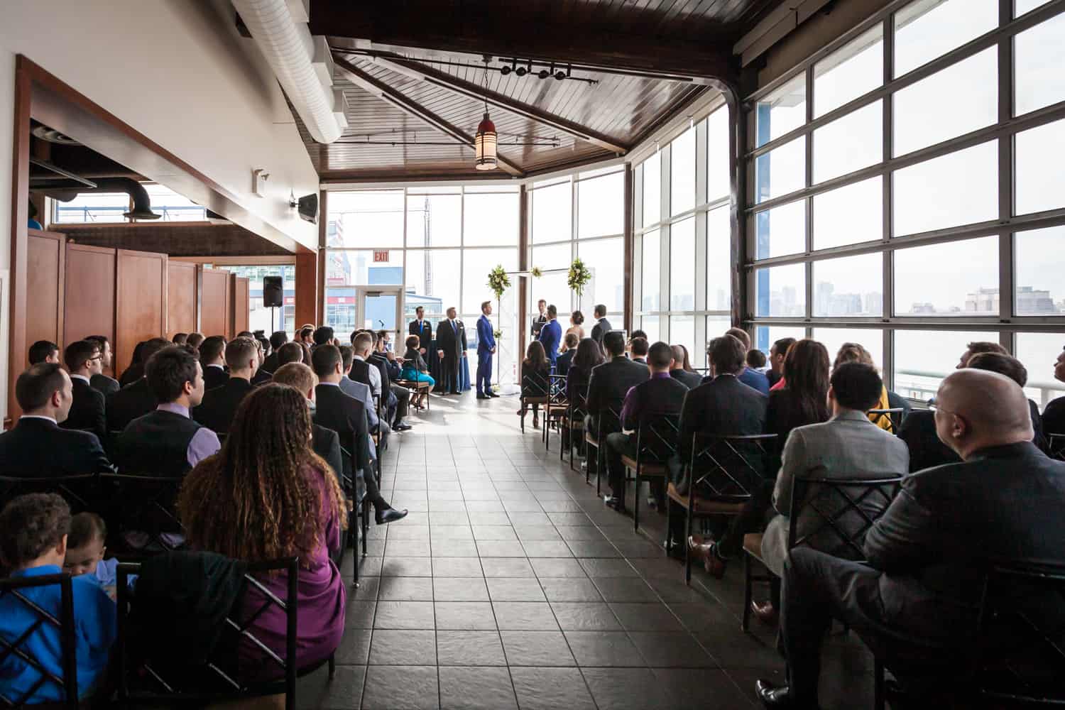 Wide shot of ceremony at a Lighthouse at Chelsea Piers wedding