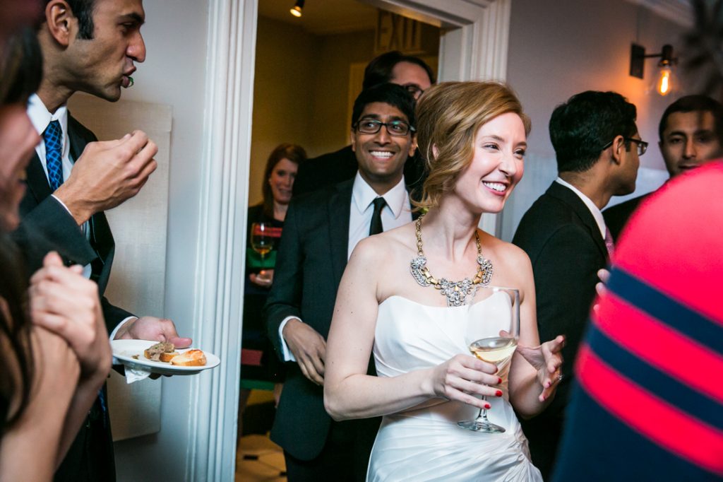 Bride and groom entering reception at a Maison May Brownstone wedding