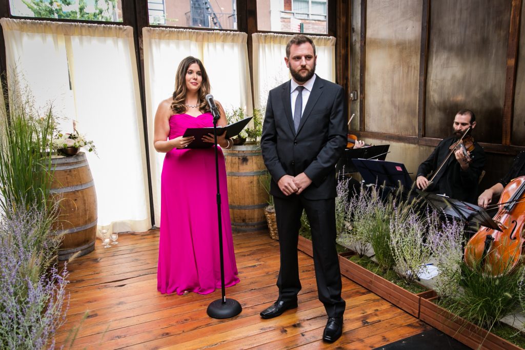 Groom and officiant waiting for bride to arrive at a Brooklyn Winery wedding