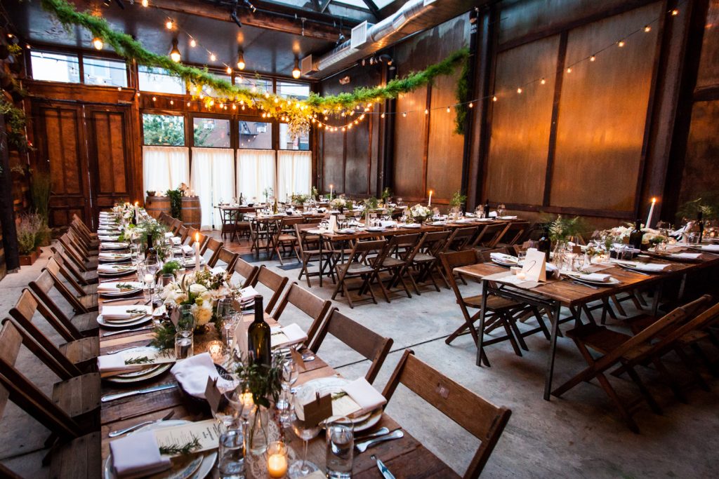 Wide shot of tables and place settings at a Brooklyn Winery wedding