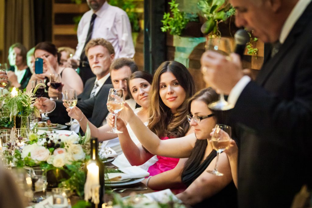 Bridal party toasting speaker at a Brooklyn Winery wedding
