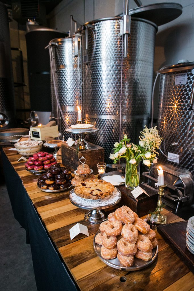 Dessert buffet with doughnuts and pie at a Brooklyn Winery wedding