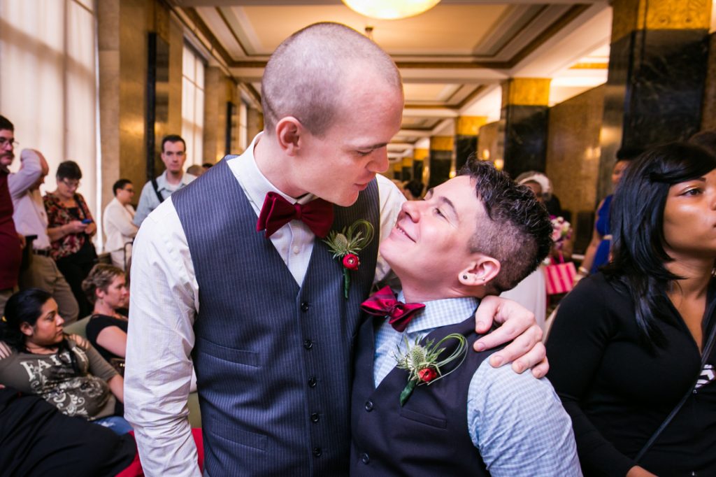 Two grooms waiting for a NYC LGBTQ City Hall wedding to begin