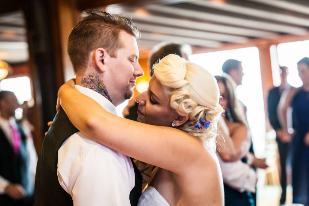 Bride and groom during first dance at Riviera Waterfront Mansion wedding