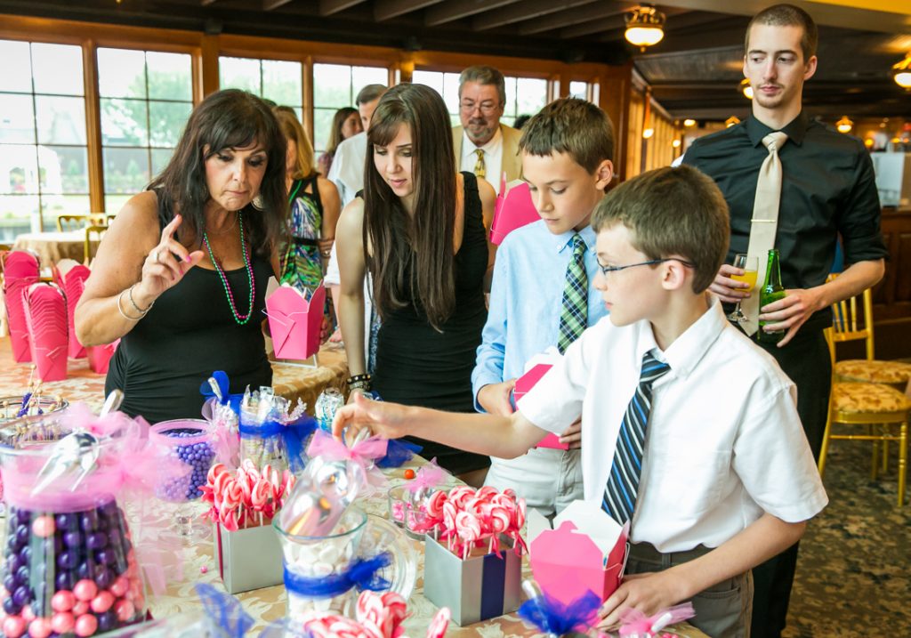 Guests at candy buffet at Riviera Waterfront Mansion wedding