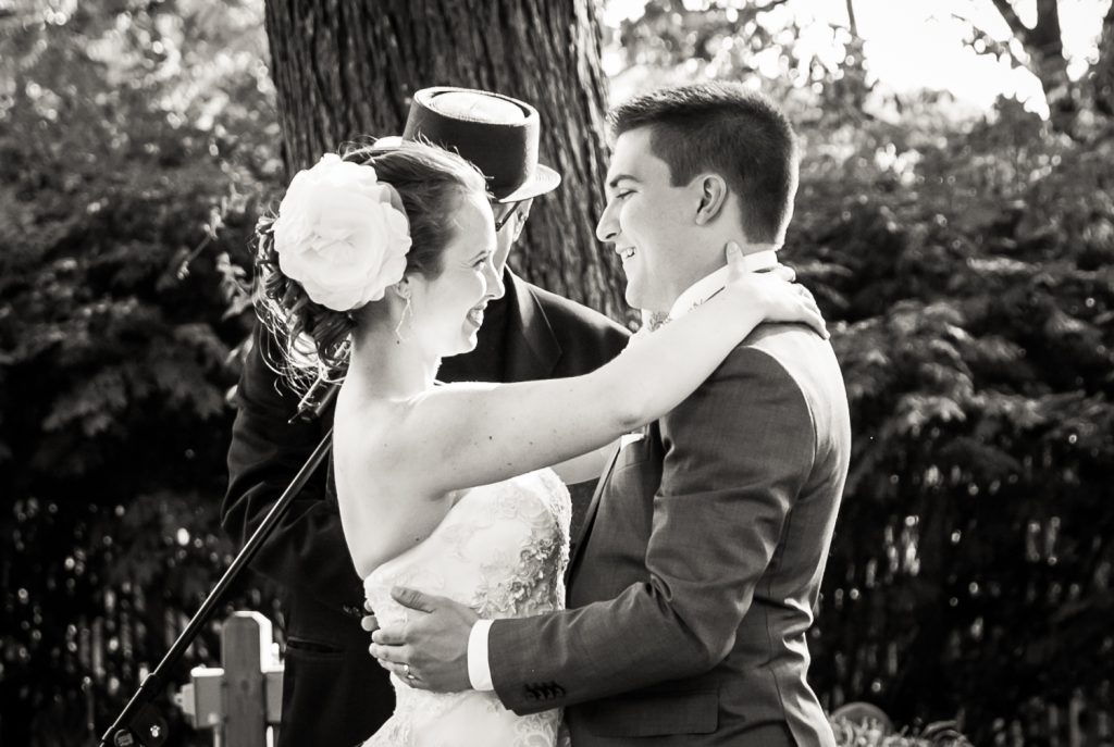 Black and white photo of bride and groom during Round HIll House ceremony