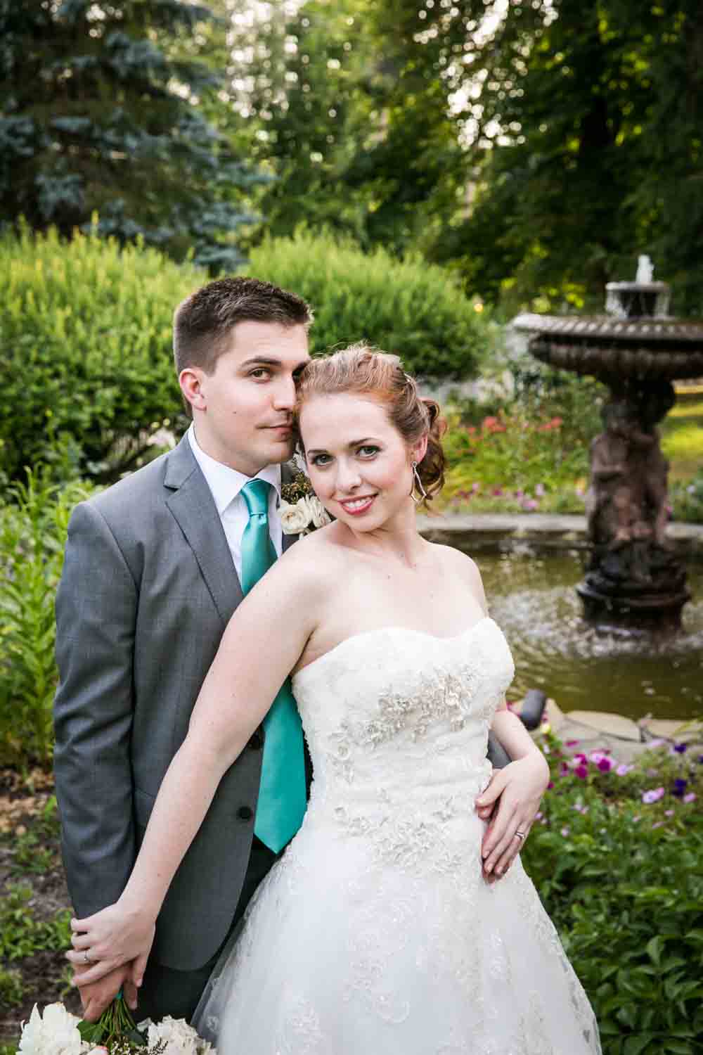 Bride and groom in garden at a Round Hill House wedding