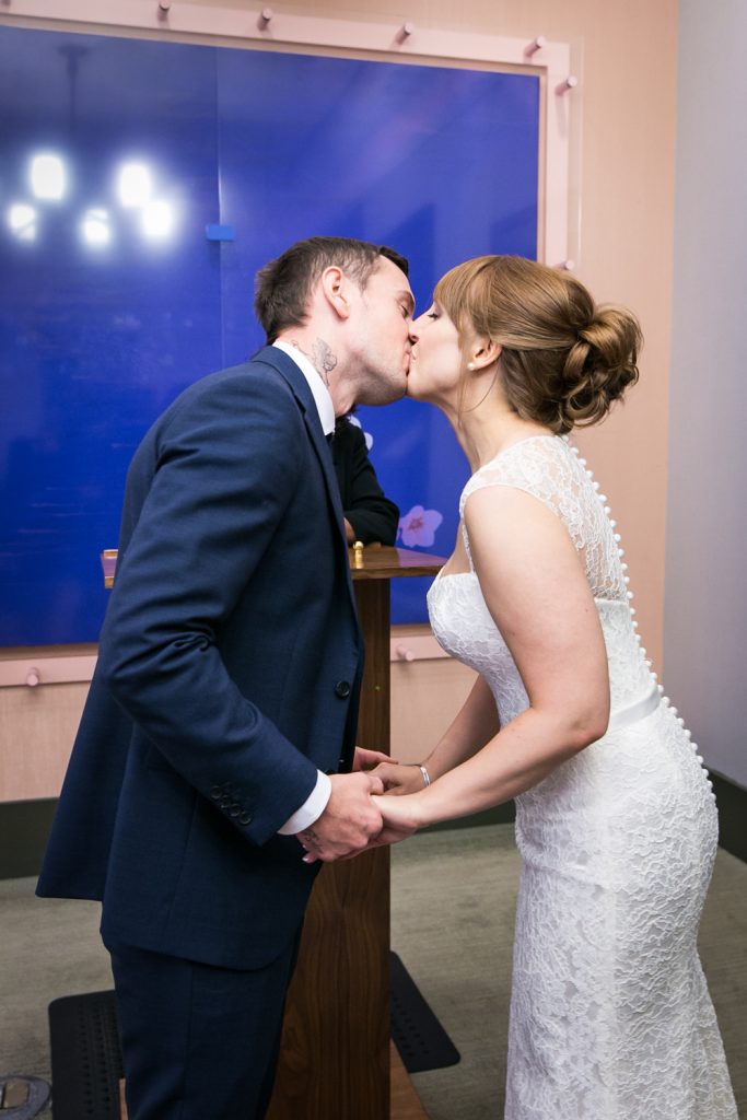 NYC City Hall wedding photos of bride and groom kissing