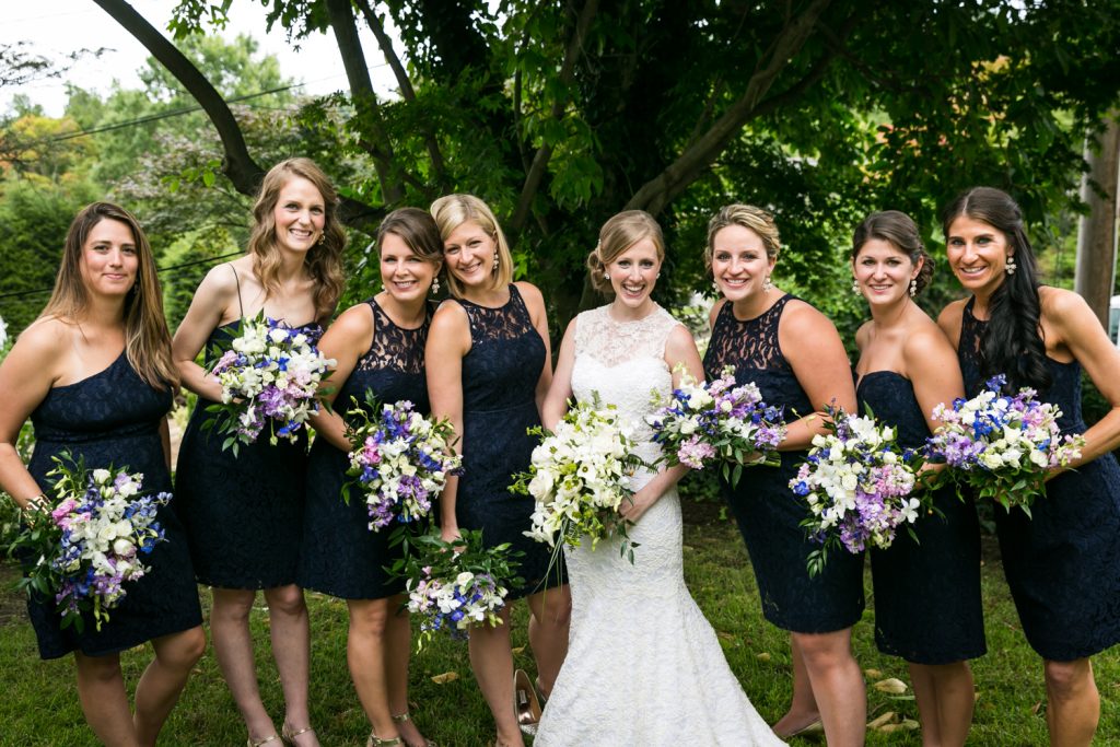 Portrait of smiling bride and bridesmaids at an American Yacht Club wedding