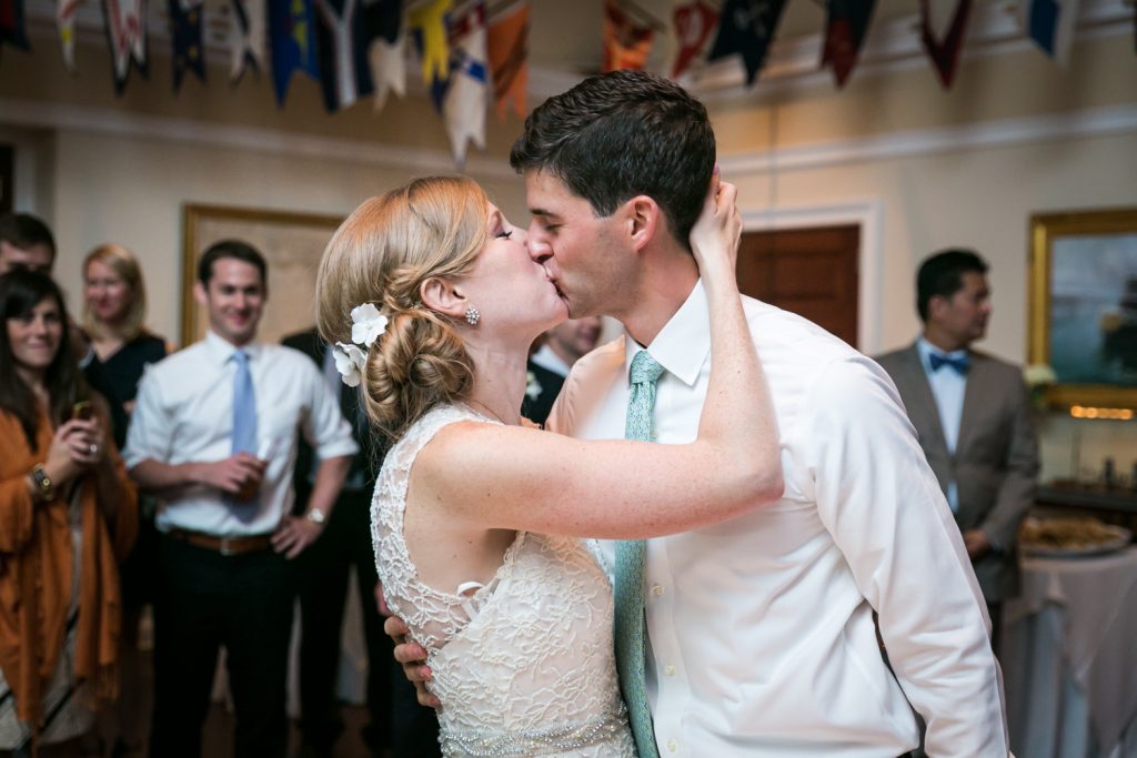 Bride and groom kissing at an American Yacht Club wedding