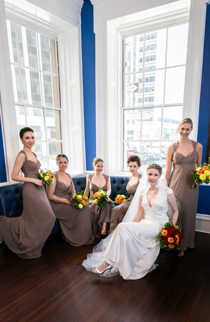 Portrait of bridesmaids in front of window at an India House wedding