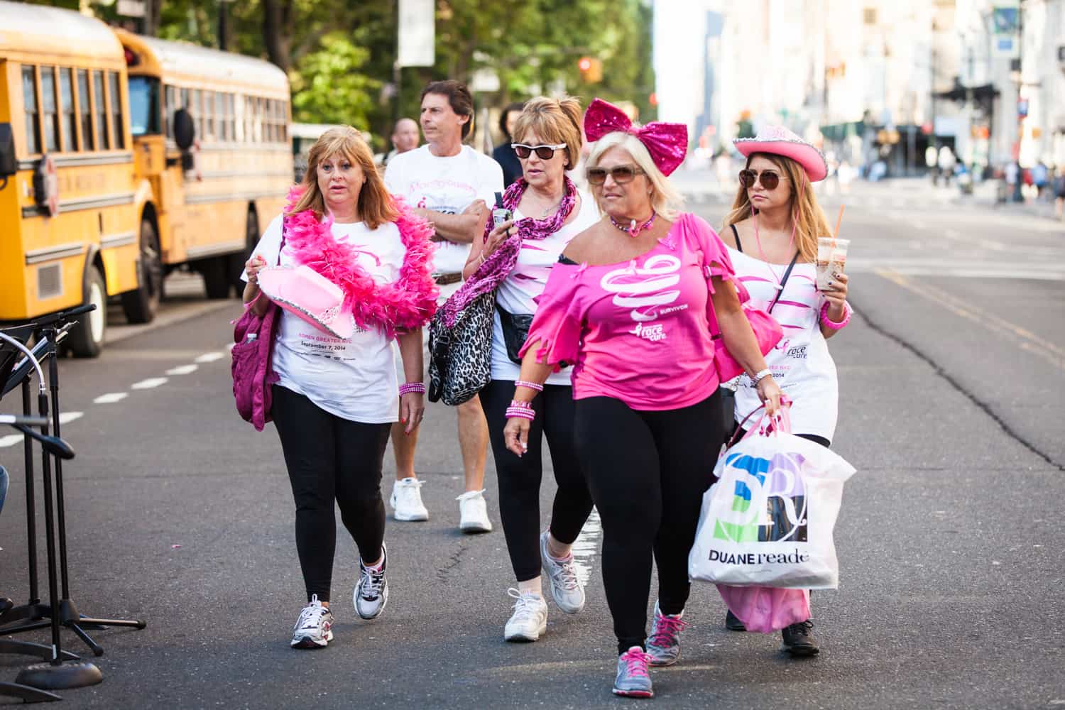 NYC Race for the Cure photos of group of supporters wearing pink outfits