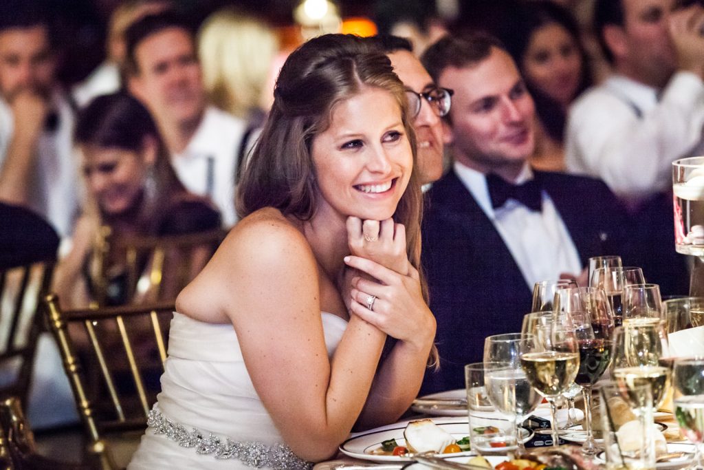 Bride listening to speeches at a University Club wedding